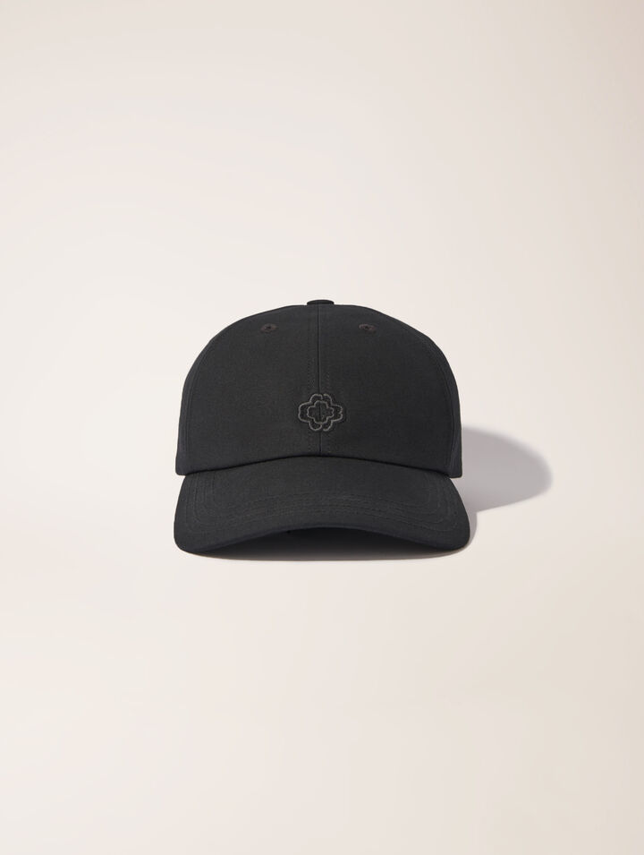 Cotton cap with gold-tone buckle
