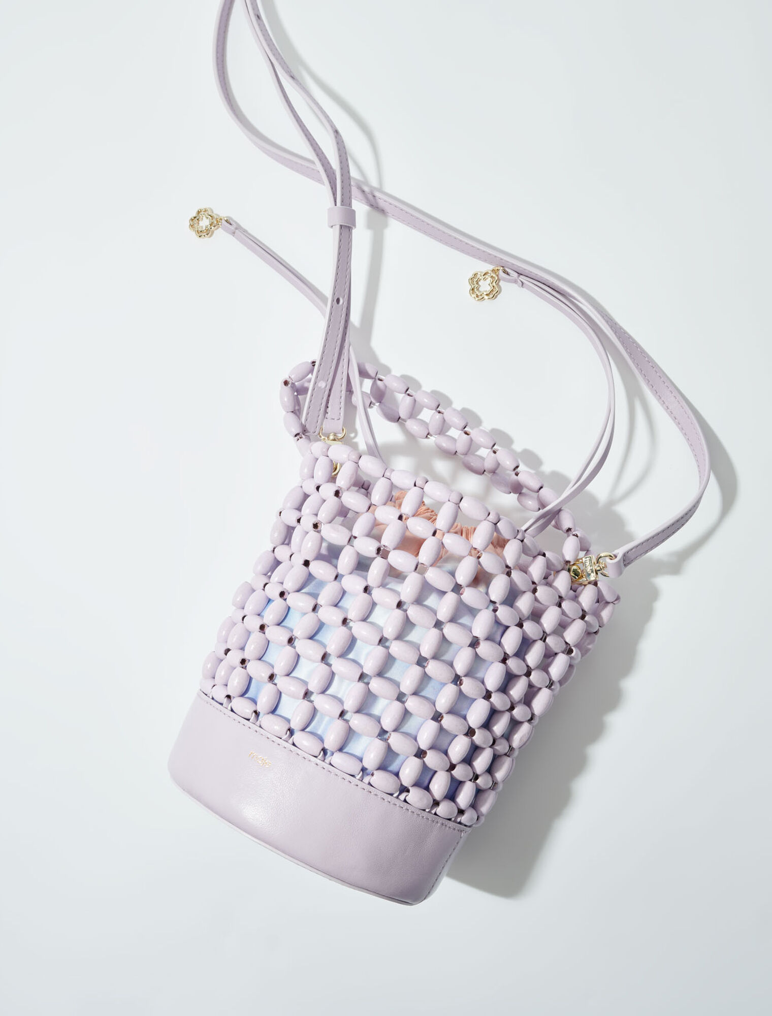 Bucket bag embellished with beads