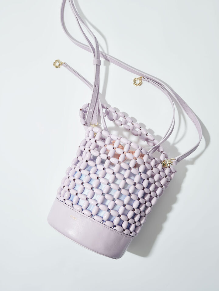 Bucket bag embellished with beads