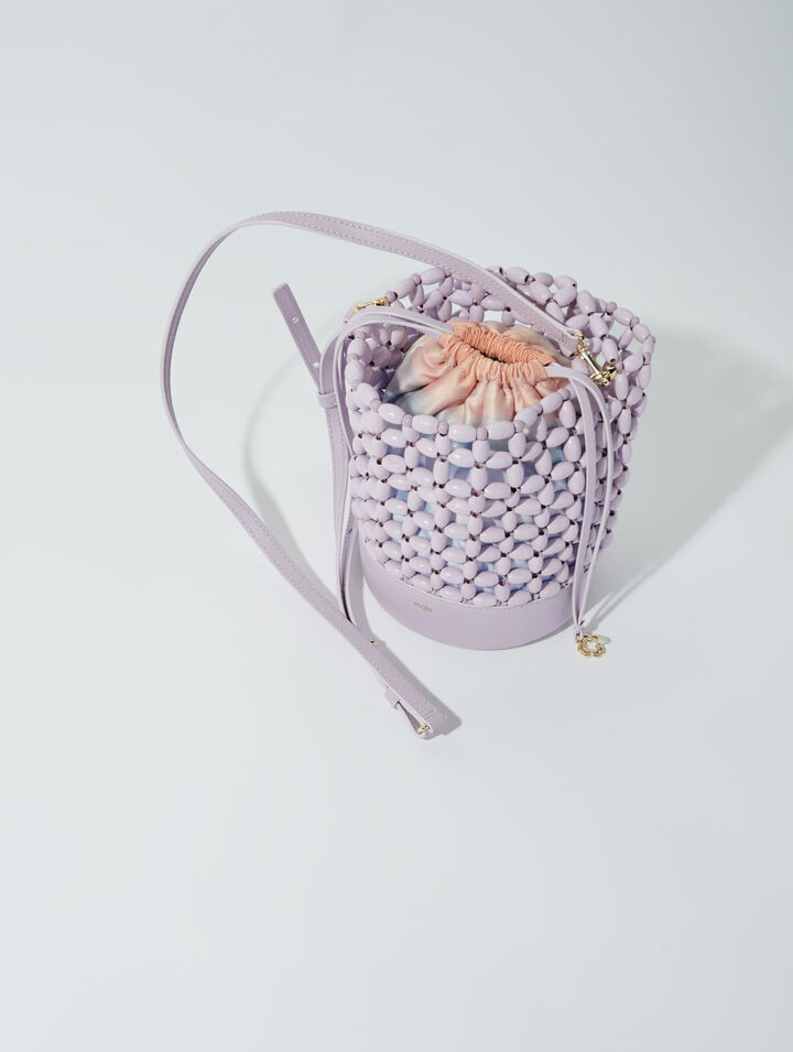 Bucket bag embellished with beads