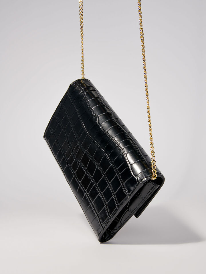 Sac pochette en cuir embossé