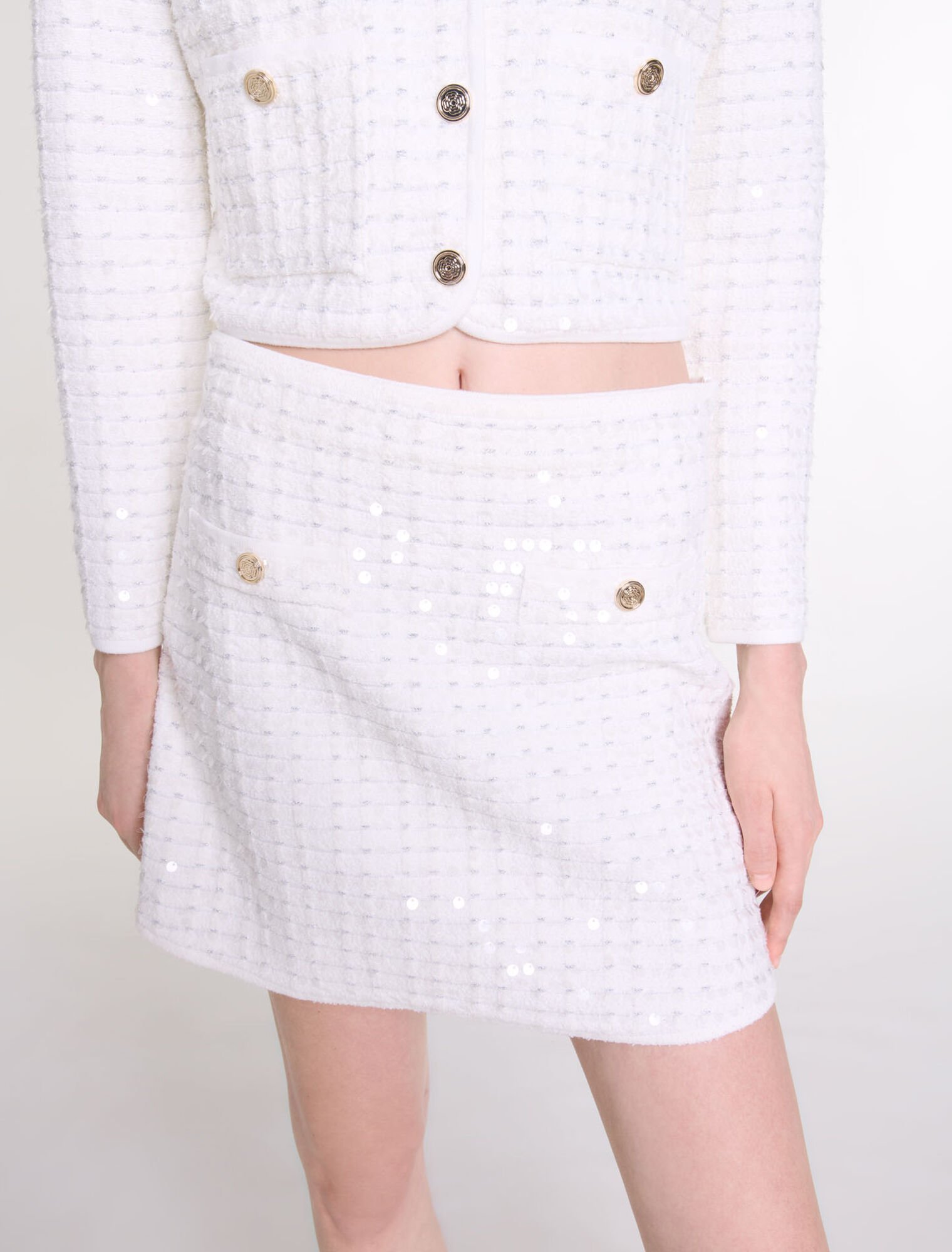 Jupe courte en maille à sequins