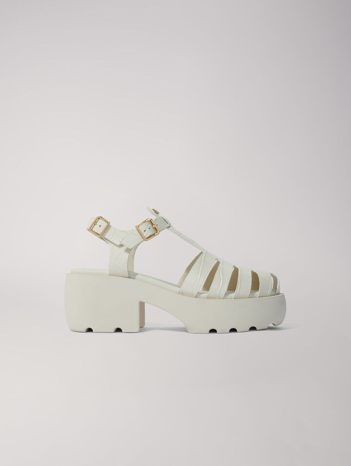 Leather sandals with tread