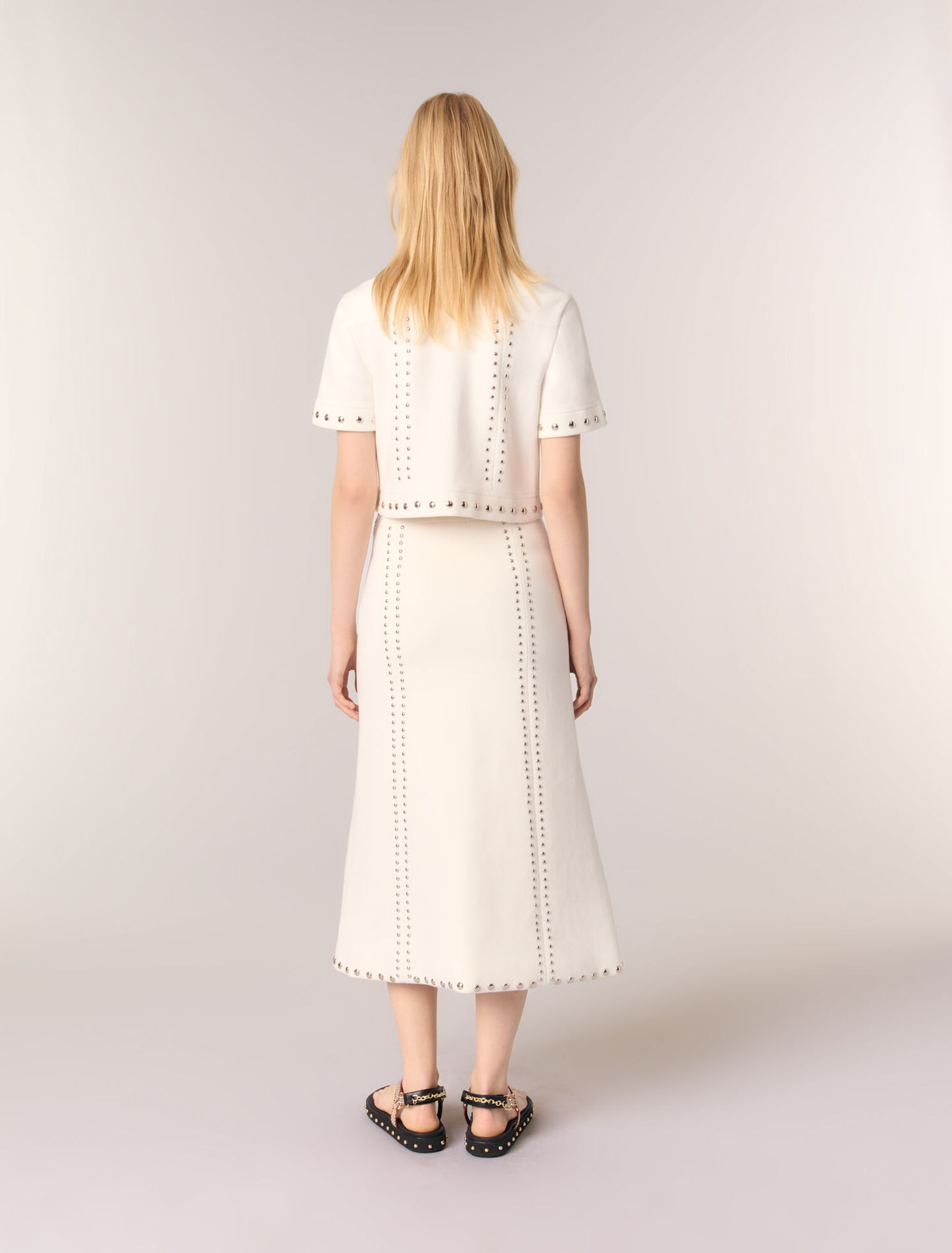 Jupe midi en maille à studs