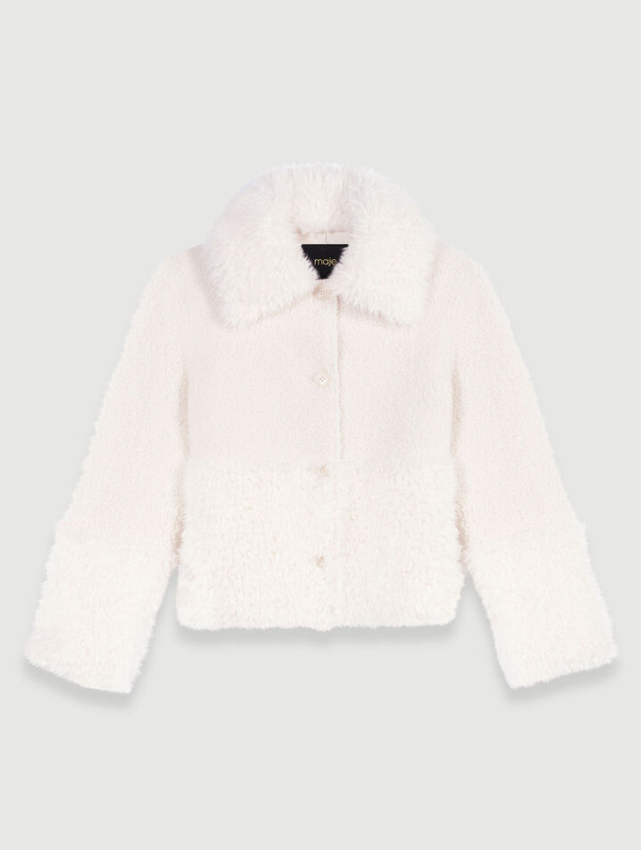 Manteau court fausse fourrure