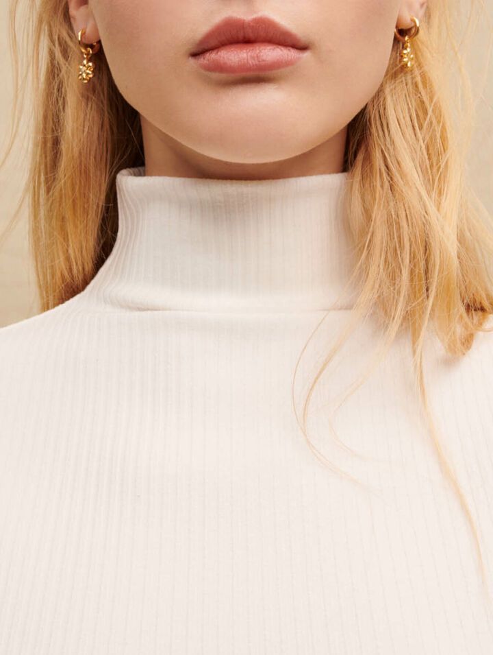 White mock-neck top