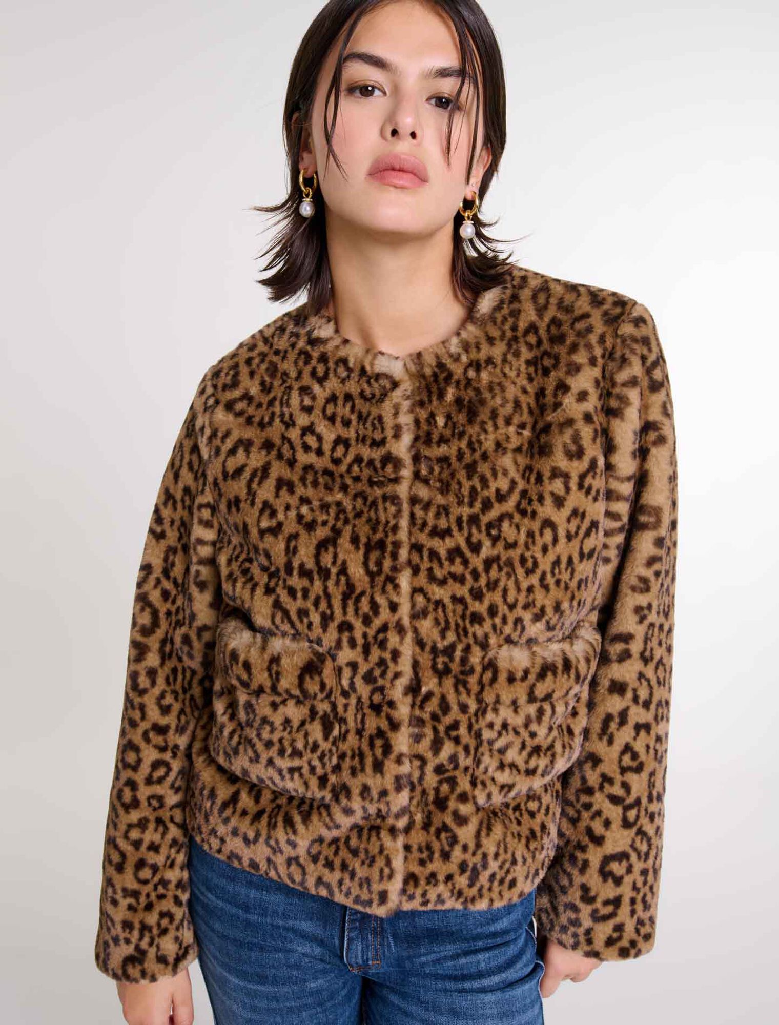 Veste courte en fausse fourrure