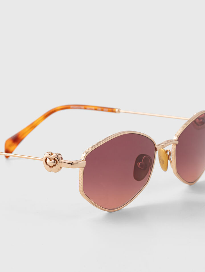 Lunettes ovales facett&eacute;es en m&eacute;tal