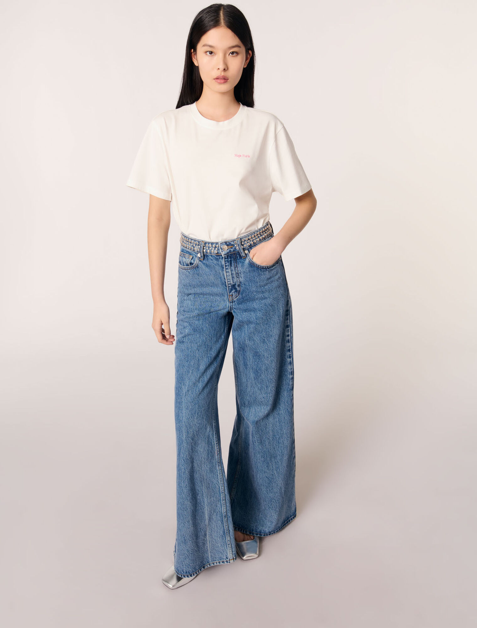 Jean flare à ceinture studée