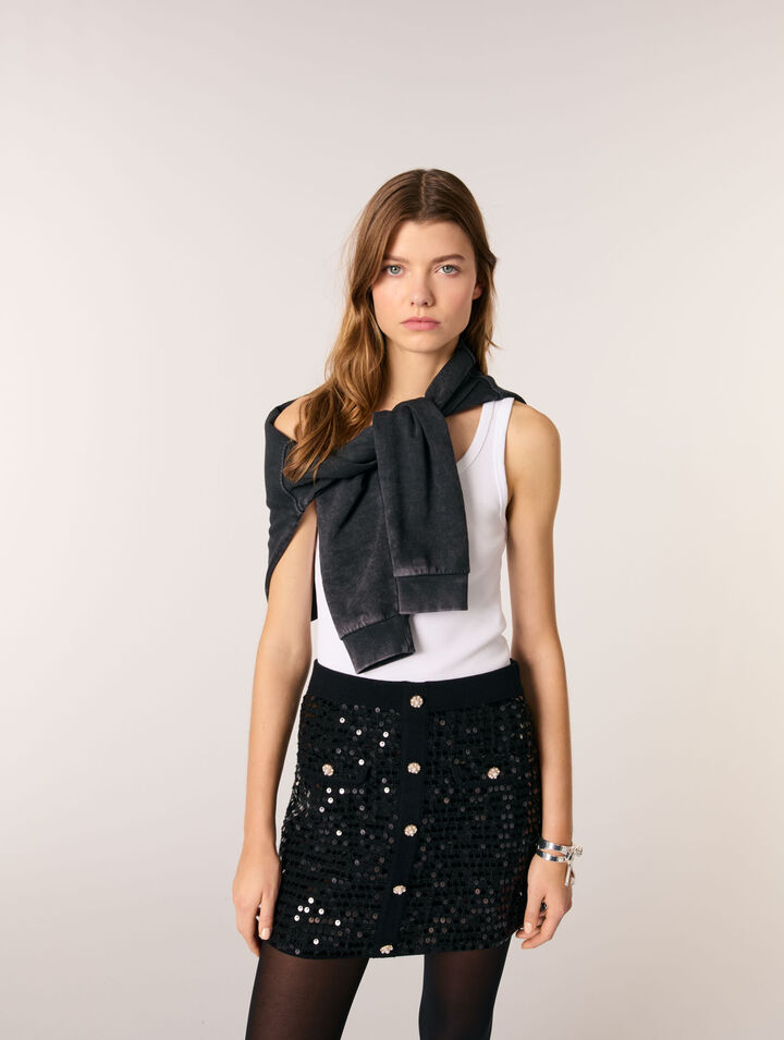 Jupe courte en maille à sequins