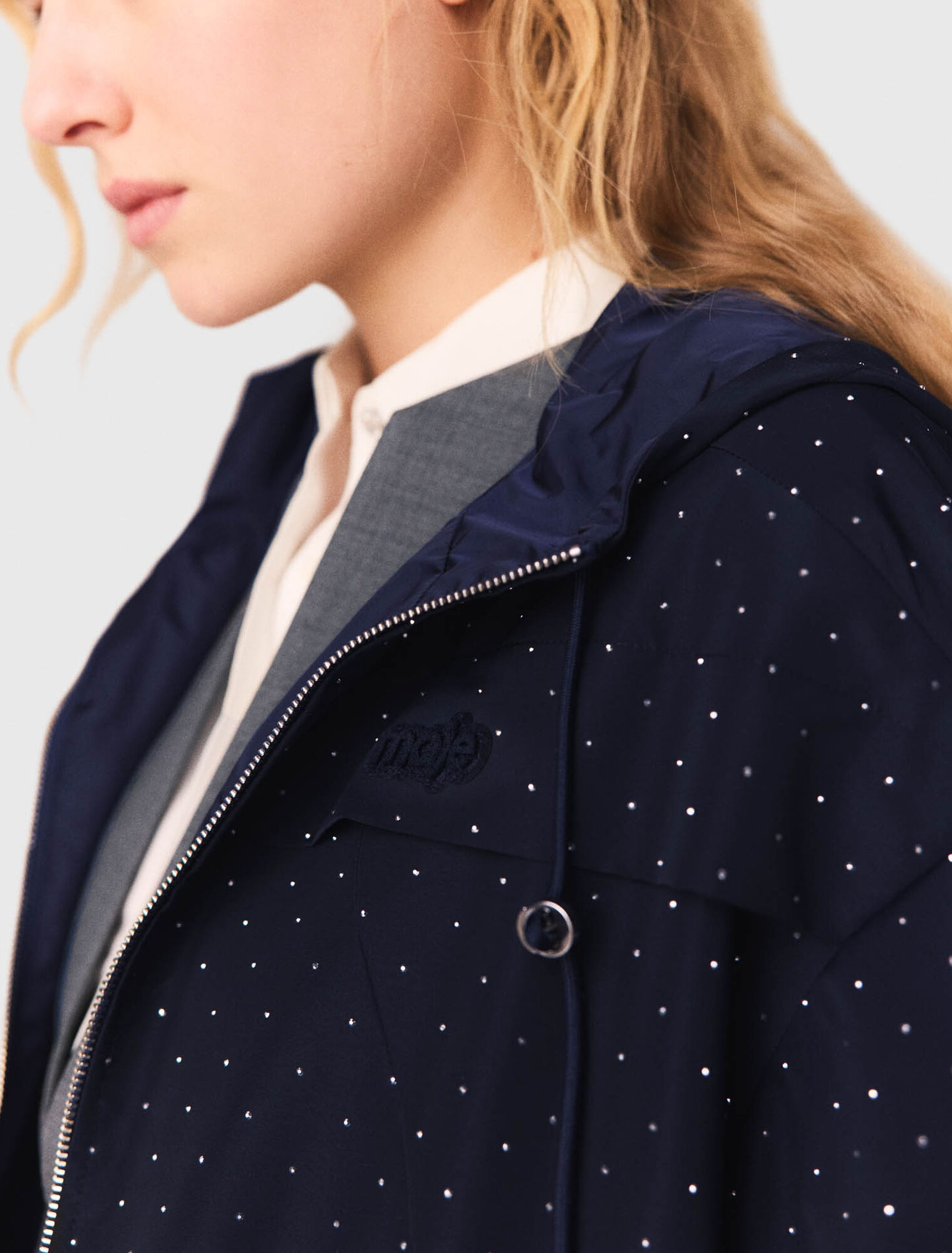 Hooded windbreaker with rhinestones