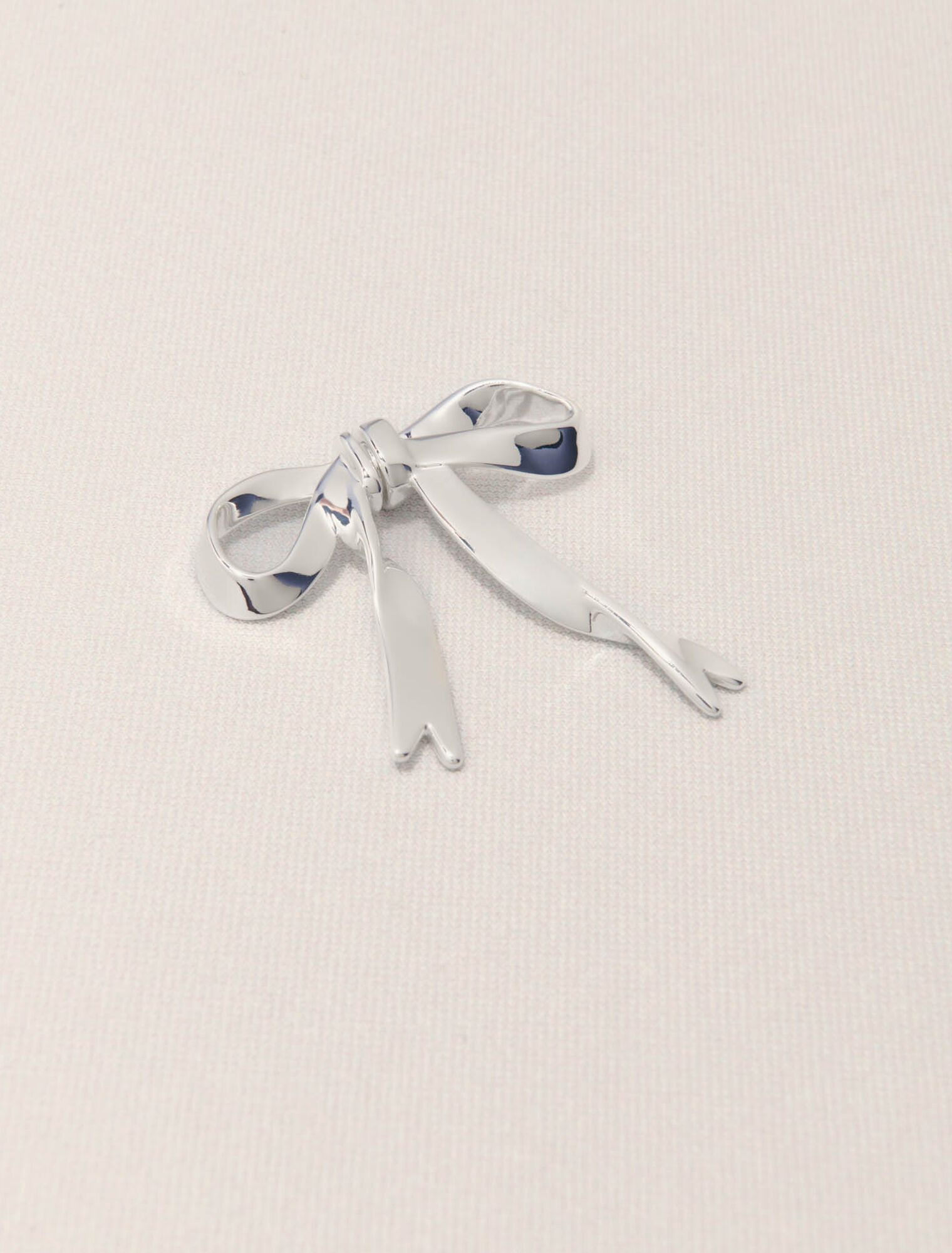 Boucle d'oreille nœud argentée