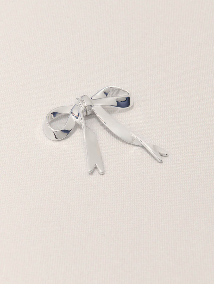 Silver bow earring