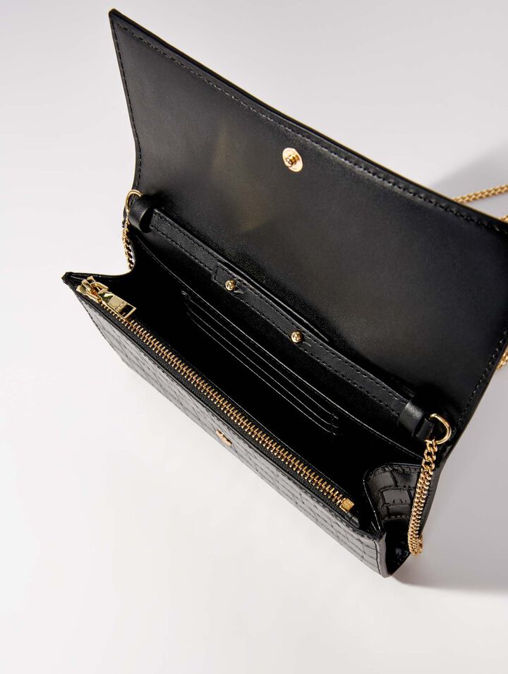 Sac pochette en cuir embossé