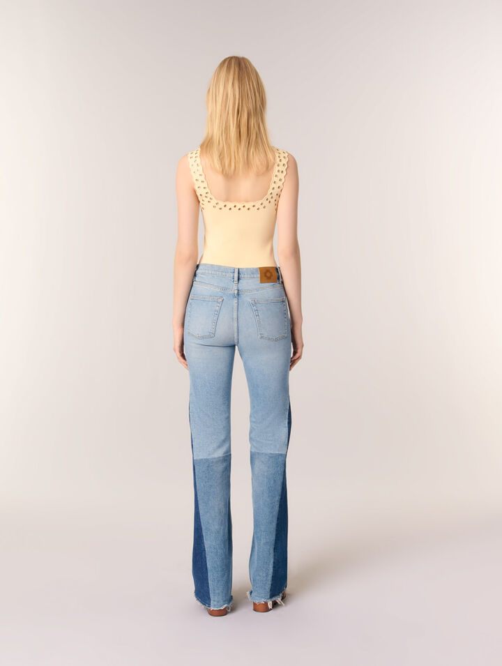 Top en maille &agrave; &oelig;illets