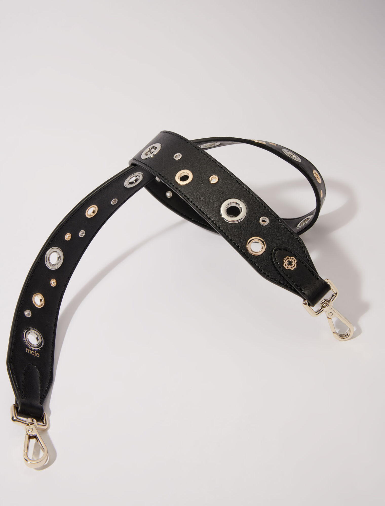 Leather shoulder strap with eyelets