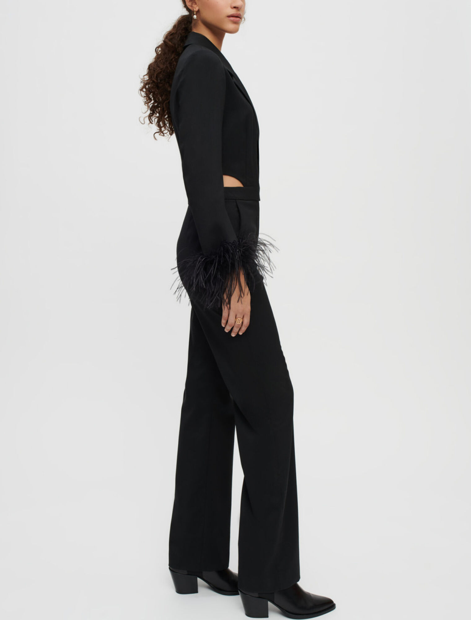 Combination pants in black with feathers