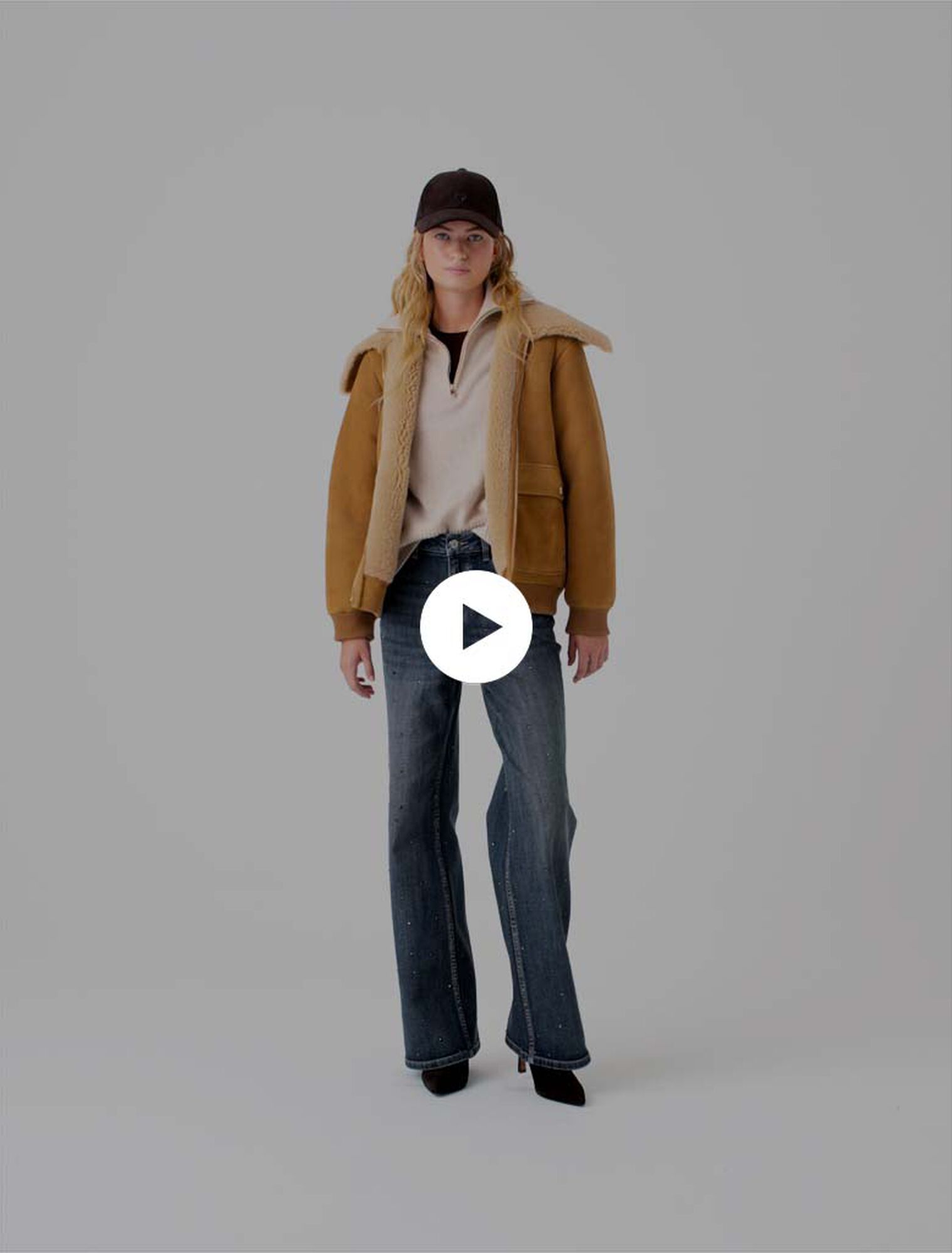 Blouson en peau lain&eacute;e
